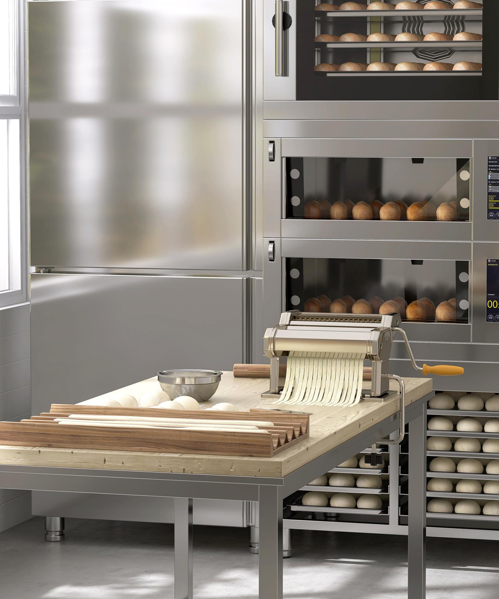 Wnętrze małej pracowni kuchennej z otwartymi półkami